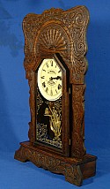 In just a single treatment, Wood Elixir solved numerous problems on this antique clock including removal of mold & mildew, paint smears, water damage, and a dried-out finish